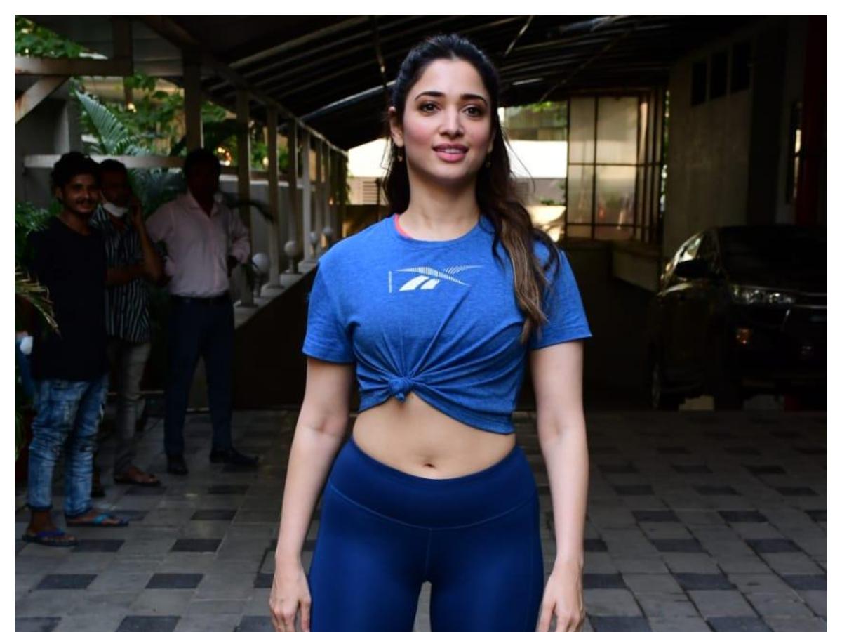Tamannaah Bhatia dons a sporty look in blue & flaunts her midriff ...