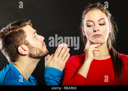 Husband apologizing wife. Man asking woman for forgivness ...