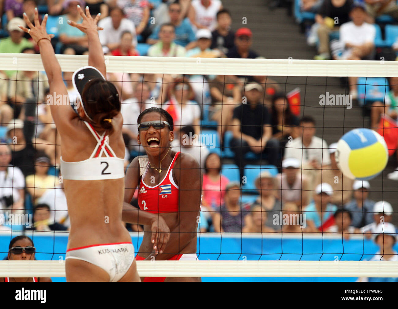 Cuba's Dalixia Fernandez blasts a shot past Japan's Chiaki ...