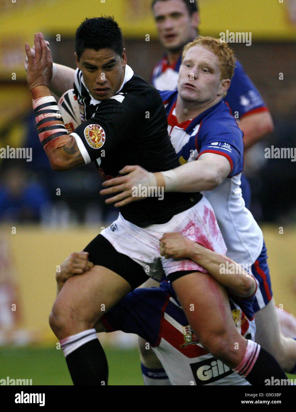 Great Britain's James Graham tackles New Zealand's Shontayne Hape ...