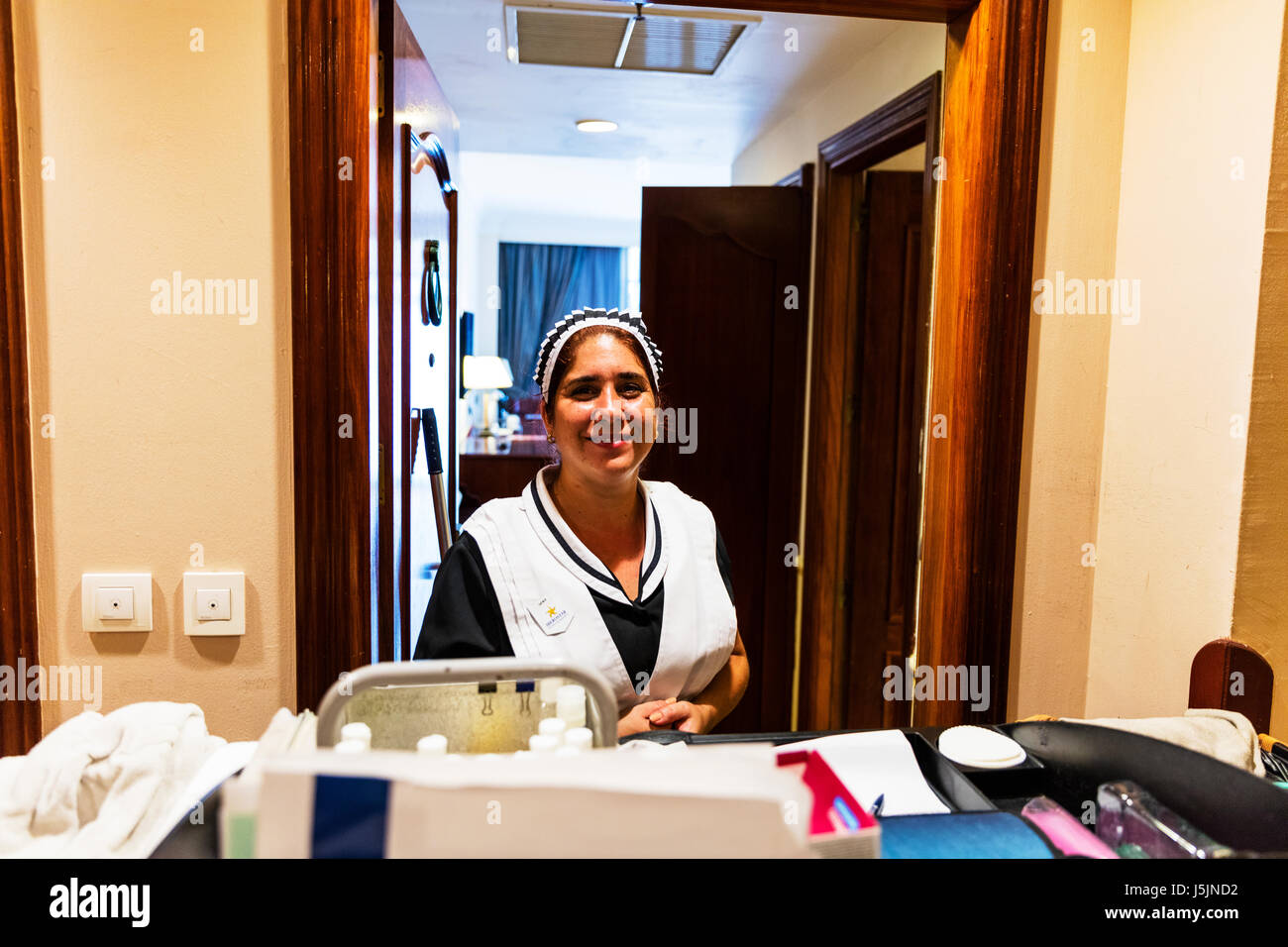 Maid cleaning rooms in hotel, Cuban maid, hotel maid, Cuban hotel ...