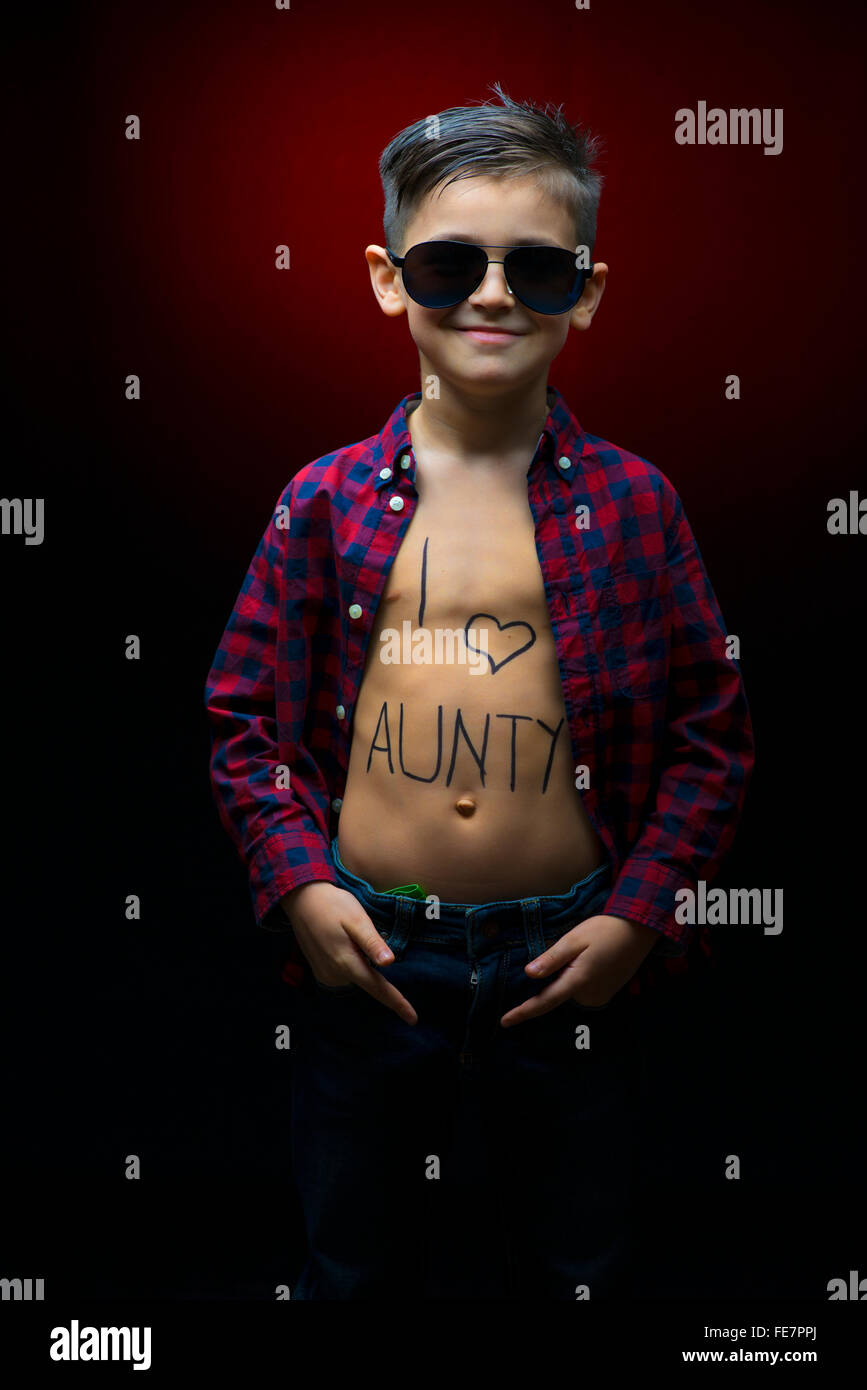Little boy with sun glasses and I love aunty message written on ...