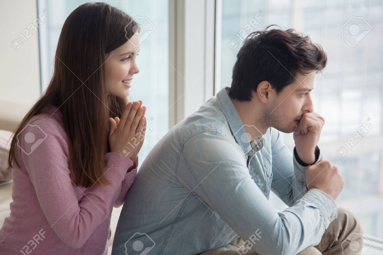 Young Woman Apologizing Upset Frustrated Man At Home. Girlfriend ...