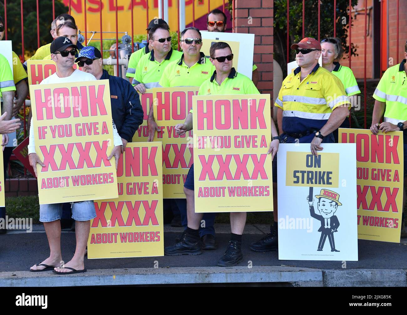 XXXX brewery workers are seen outside the Milton Brewery after ...