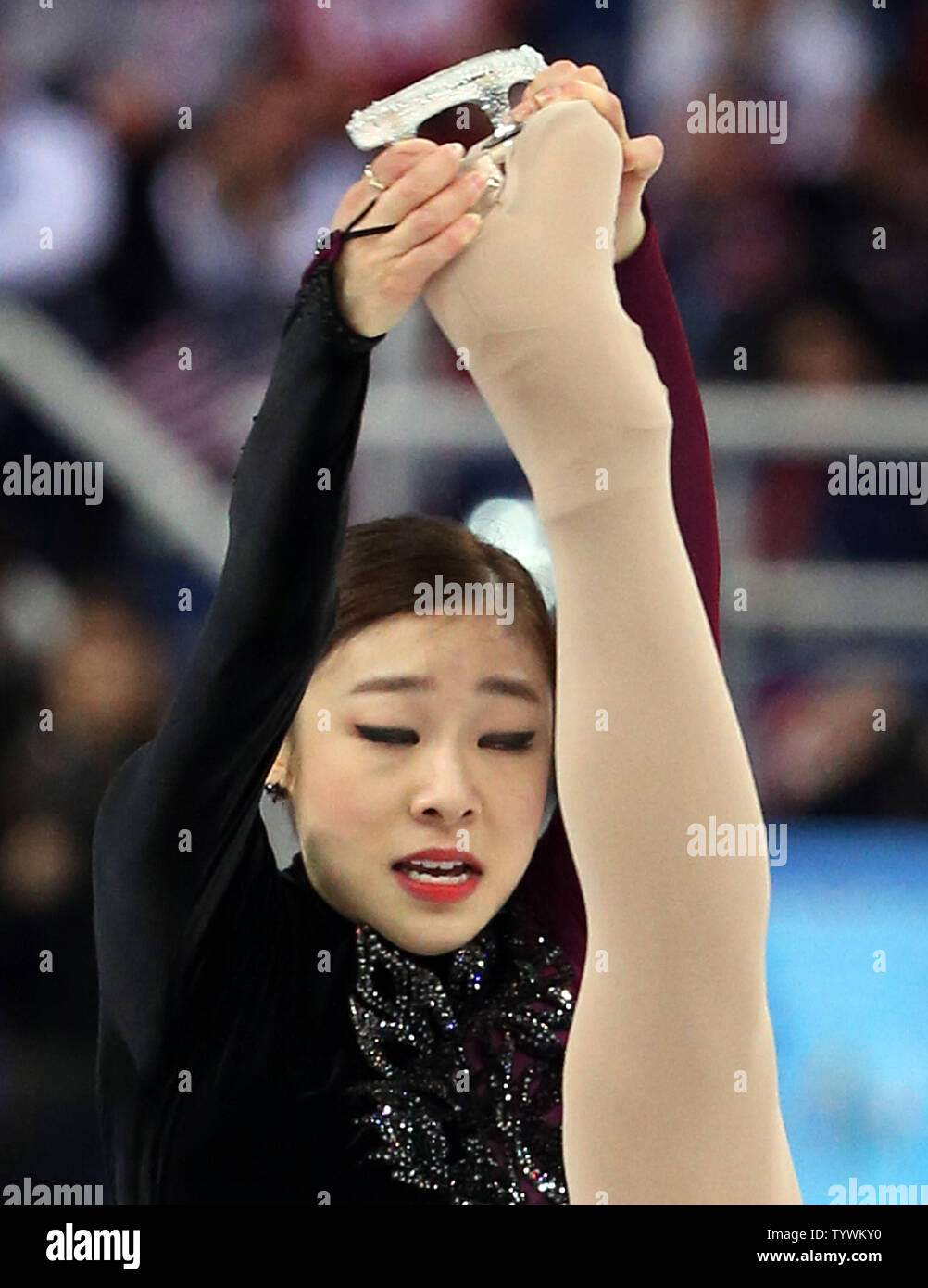Korea's silver medalist Kim Yuna performs during the ladies ...
