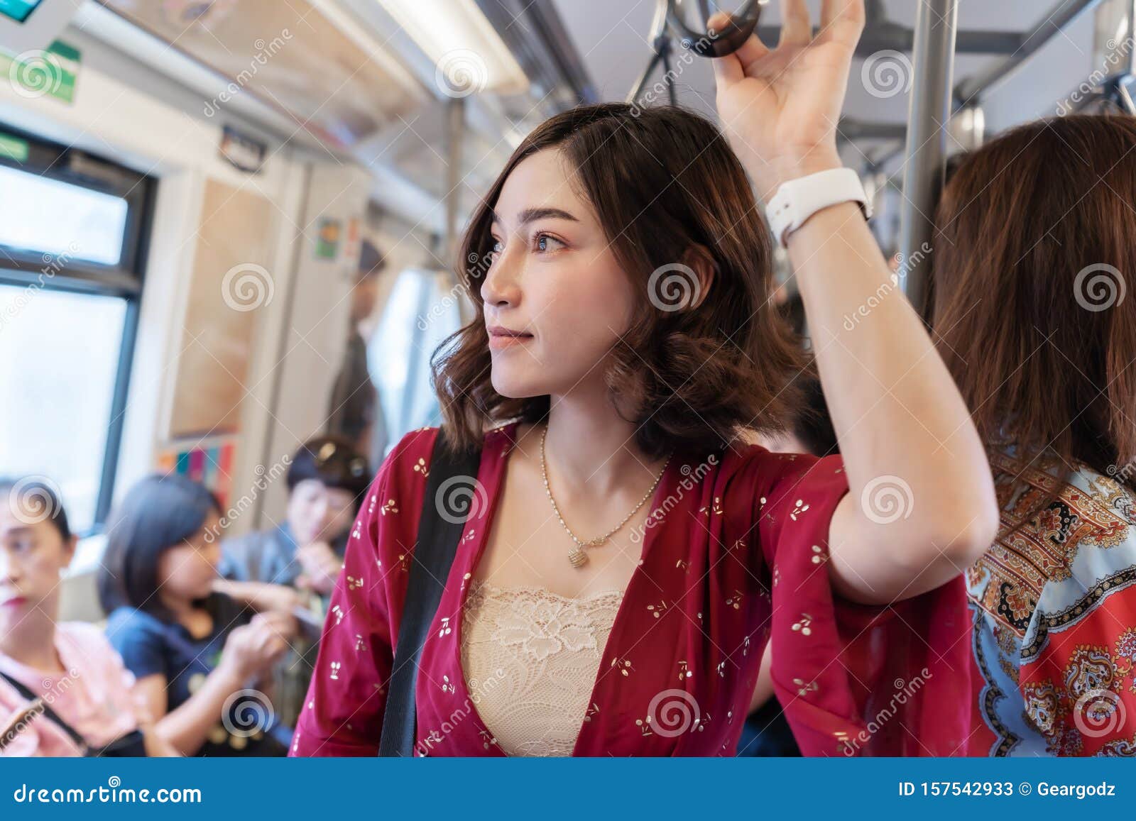 Woman Holding Handrail Standing in the Crowded Train in Bandkok ...