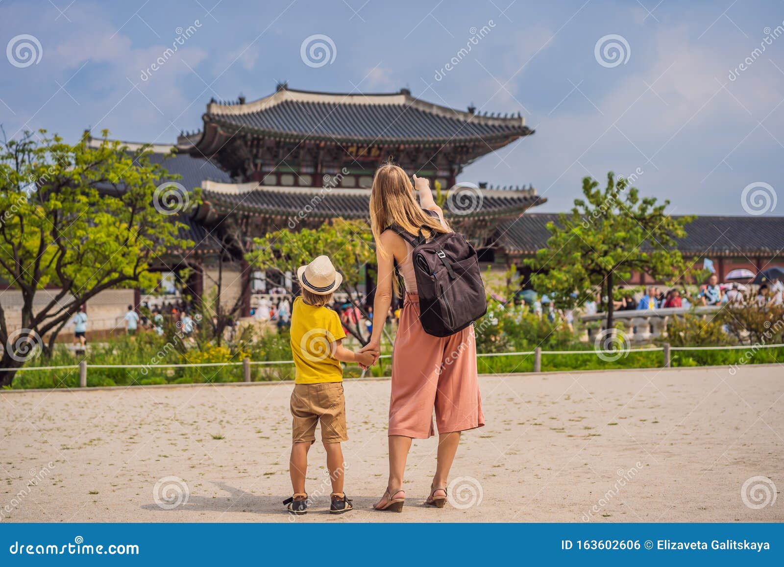 Mom and Son Tourists in Korea. Gyeongbokgung Palace Grounds in ...