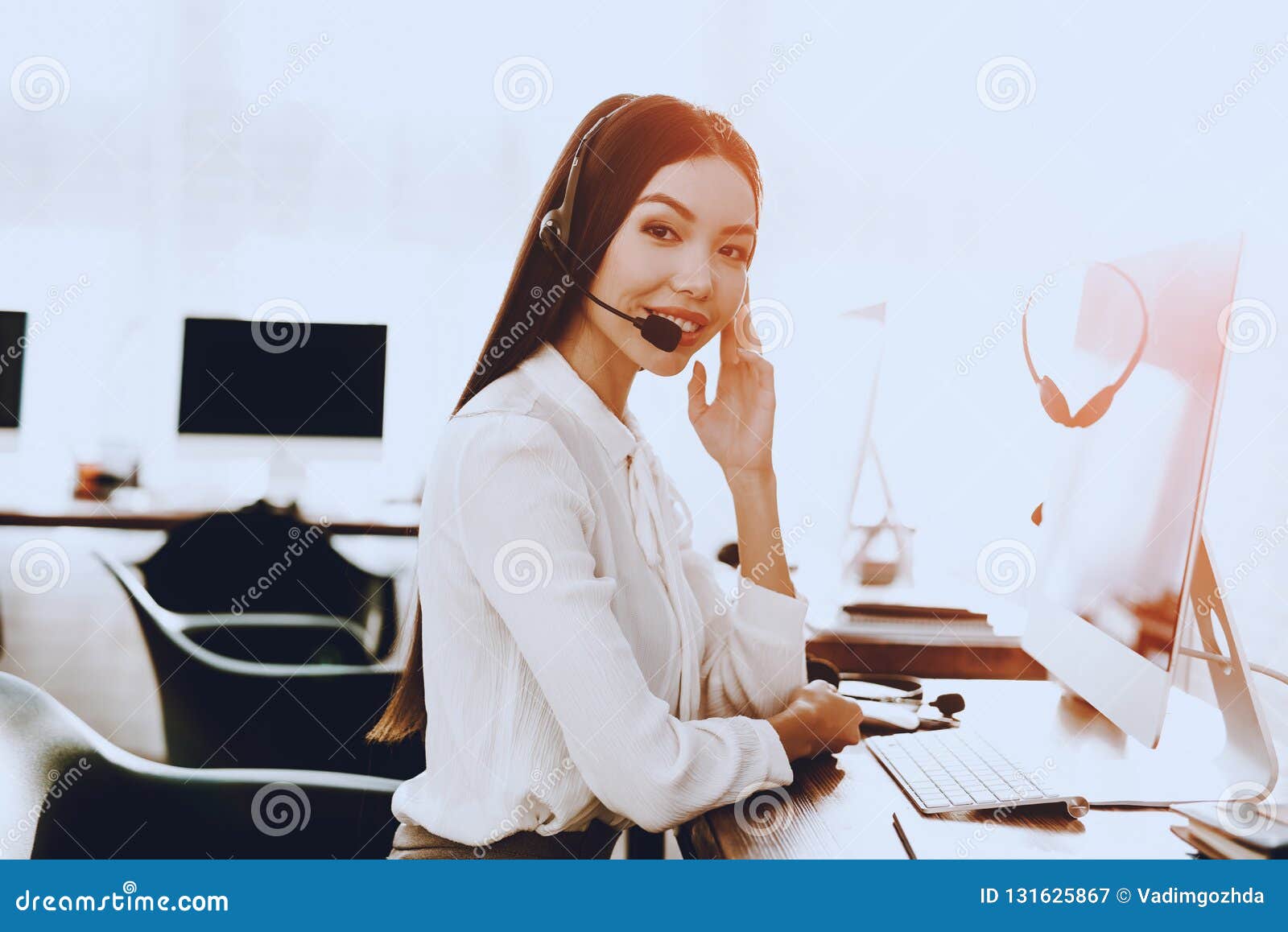 Young Woman Sitting and Working in Call Center. Manager with ...