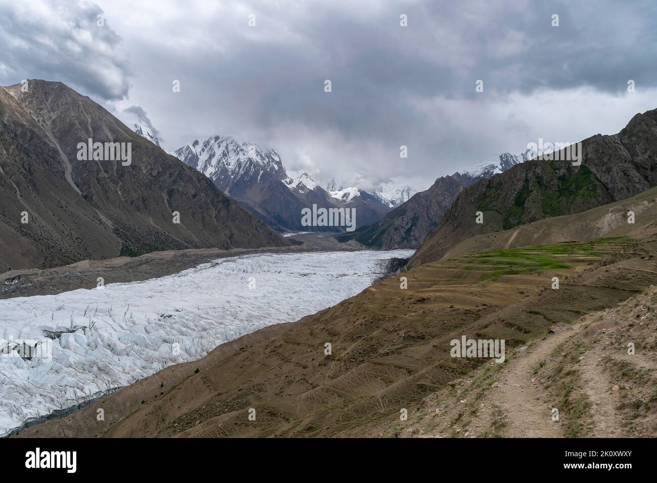 A scenic view of Barpu Glacier against Rush Lake, Karakoram ...