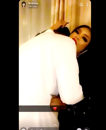 Bobrisky shares new video of him hugging and lying on a bed with a ...