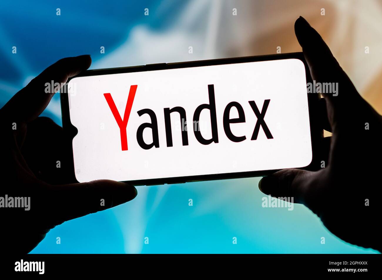 In this photo illustration, a Yandex logo seen displayed on a ...