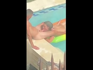 Neighbors having sex in their private swimming pool - Voyeurs HD