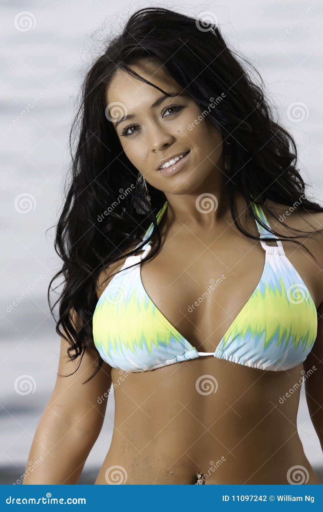 Busty Girl in Yellow and Blue Bikini Stock Photo - Image of beach ...