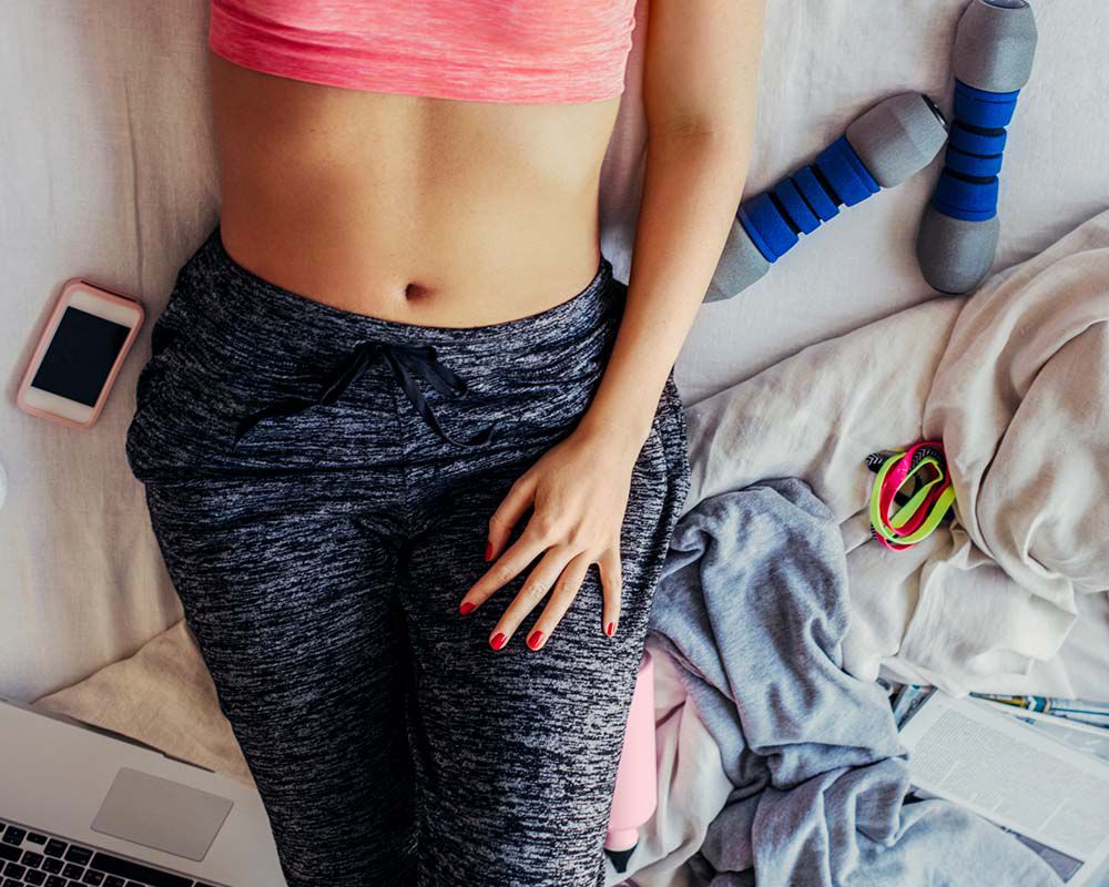 12 Exercises You Can Do In Bed While Watching Netflix