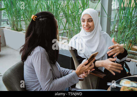 arab muslim woman in conversation Stock Photo - Alamy