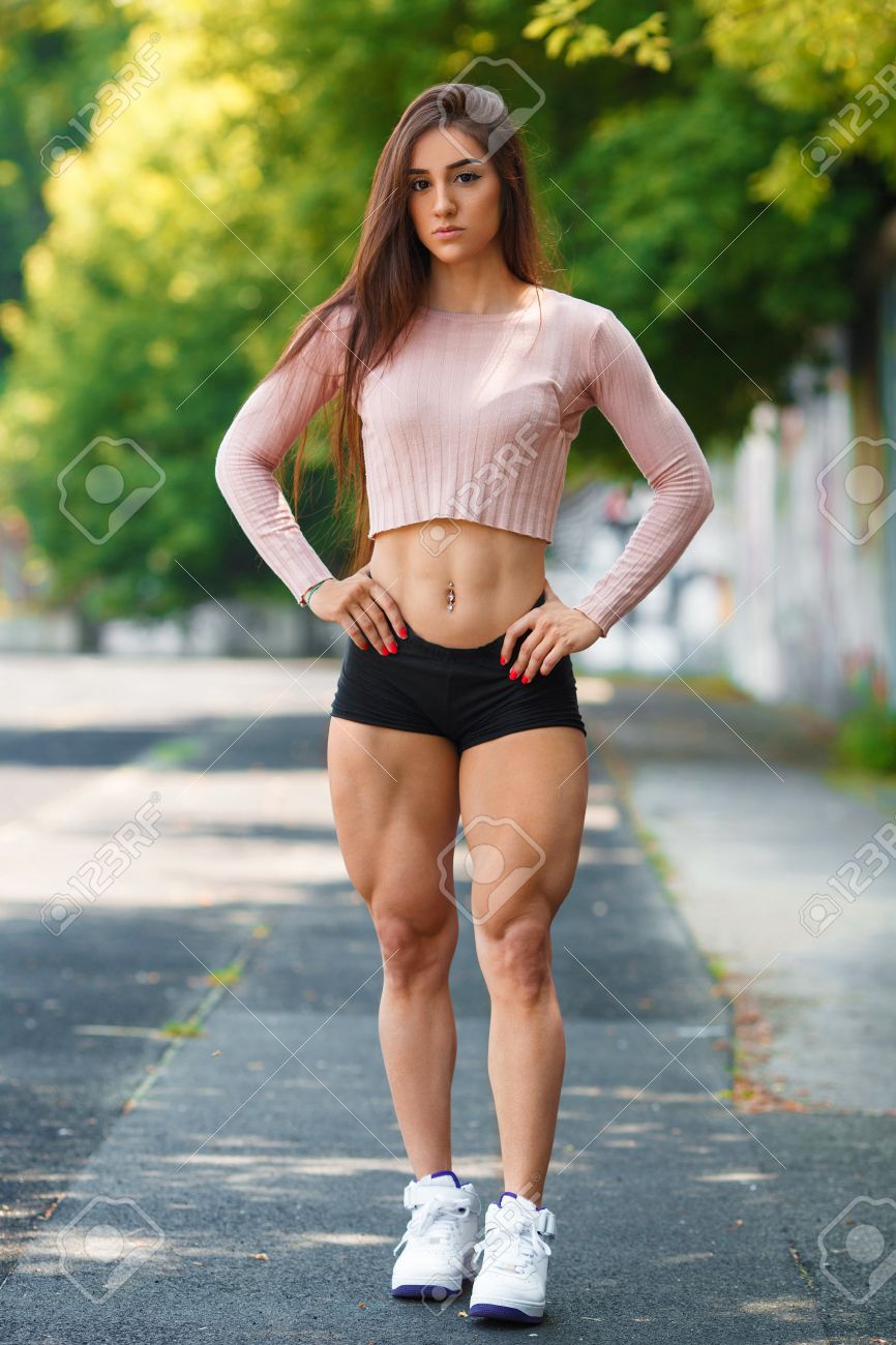 Beautiful Muscular Girl Posing Outdoor. Sexy Athletic Woman With ...