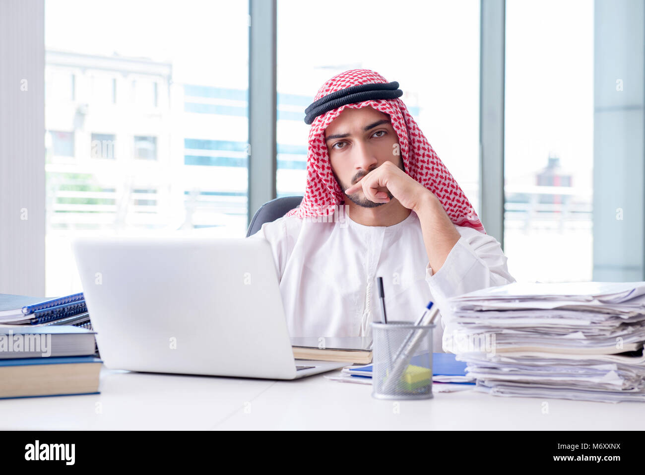 Arab businessman working in the office Stock Photo - Alamy