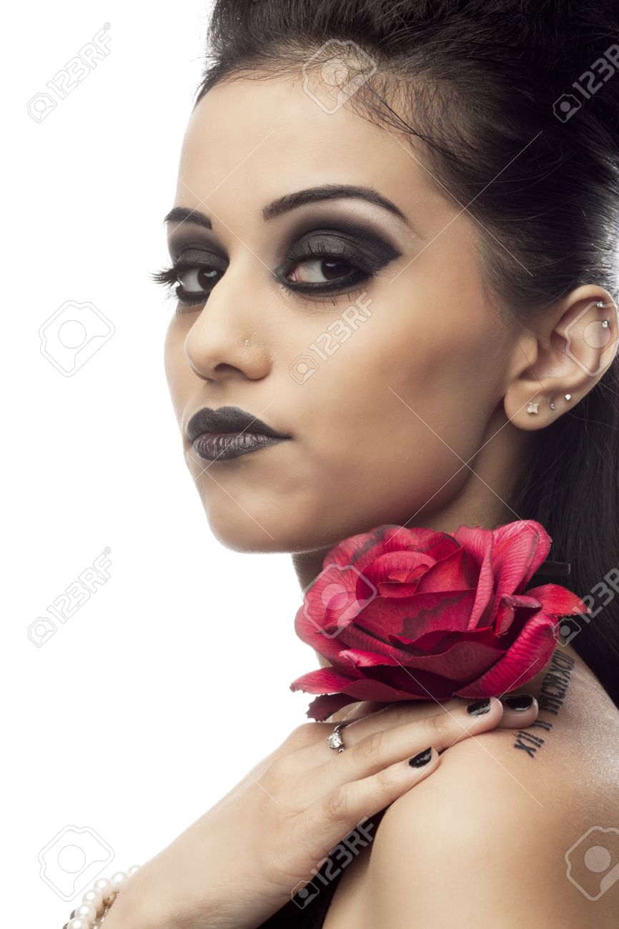 Portrait Of A Indian Female Fashion Model With A Rose Against ...