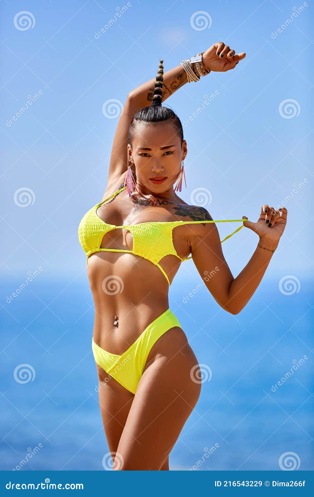 Asian Gir in Yellow Swimsuitl Enjoying at the Tropical Beach Stock ...