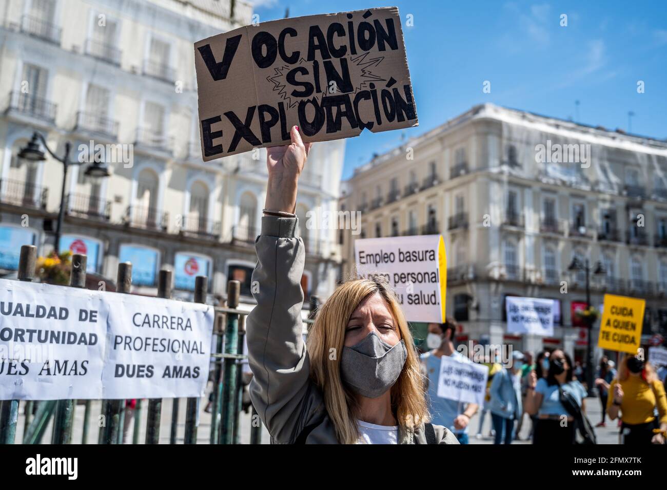 Madrid, Spain. 12th May, 2021. A nurse carrying a placard reading ...