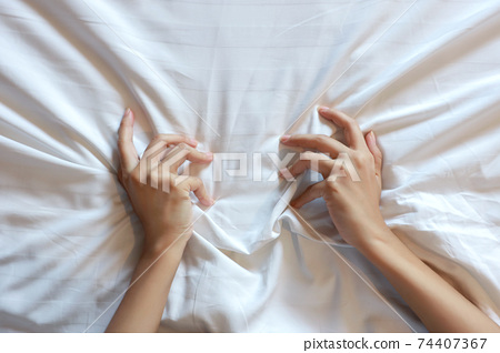 Top view young sexy woman hands pulling white... - Stock Photo ...