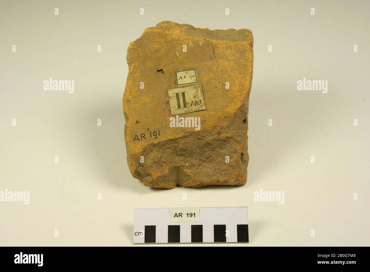 Fragment of a later brick with stamp XXXVV. Vertical and ...