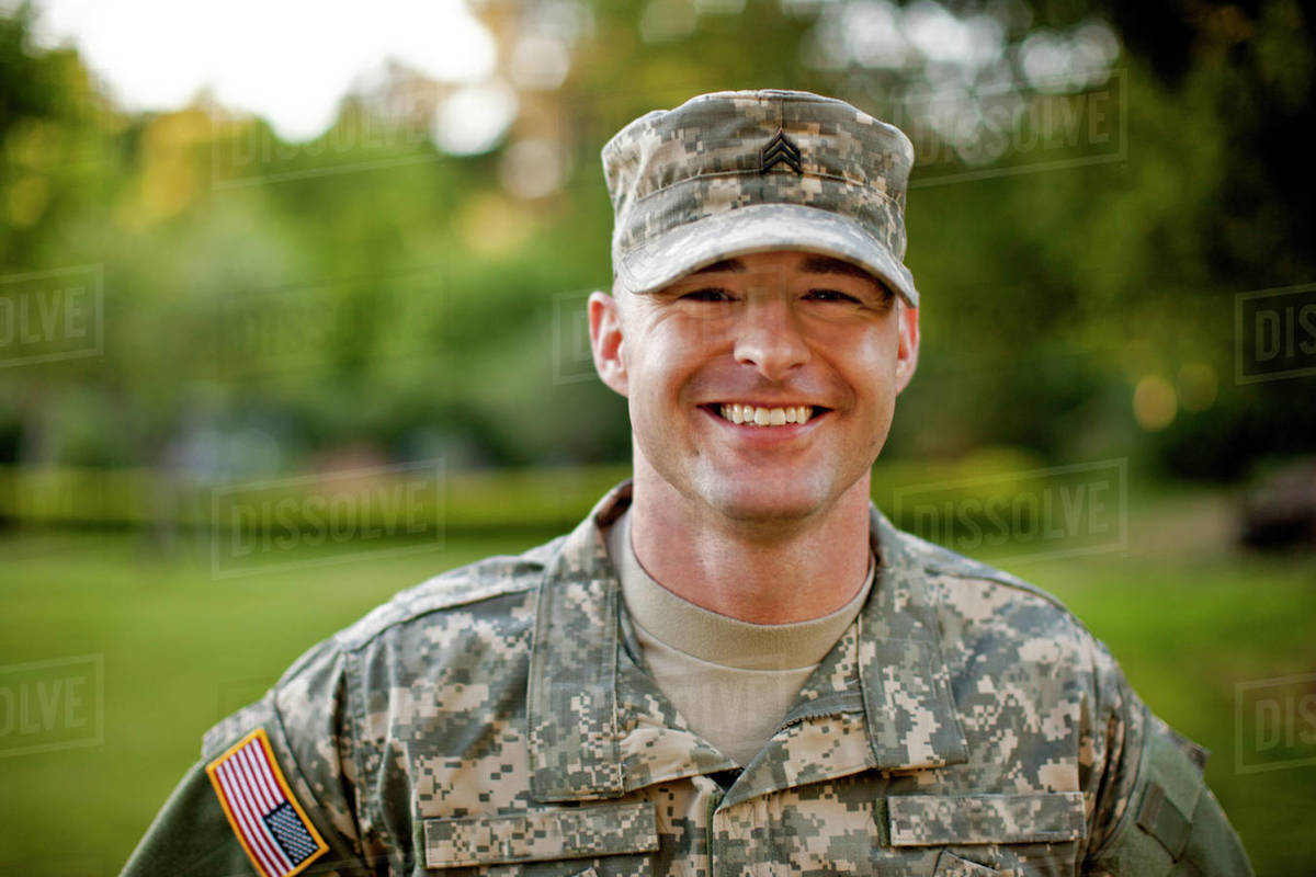 Portrait of a smiling male soldier. - Stock Photo - Dissolve