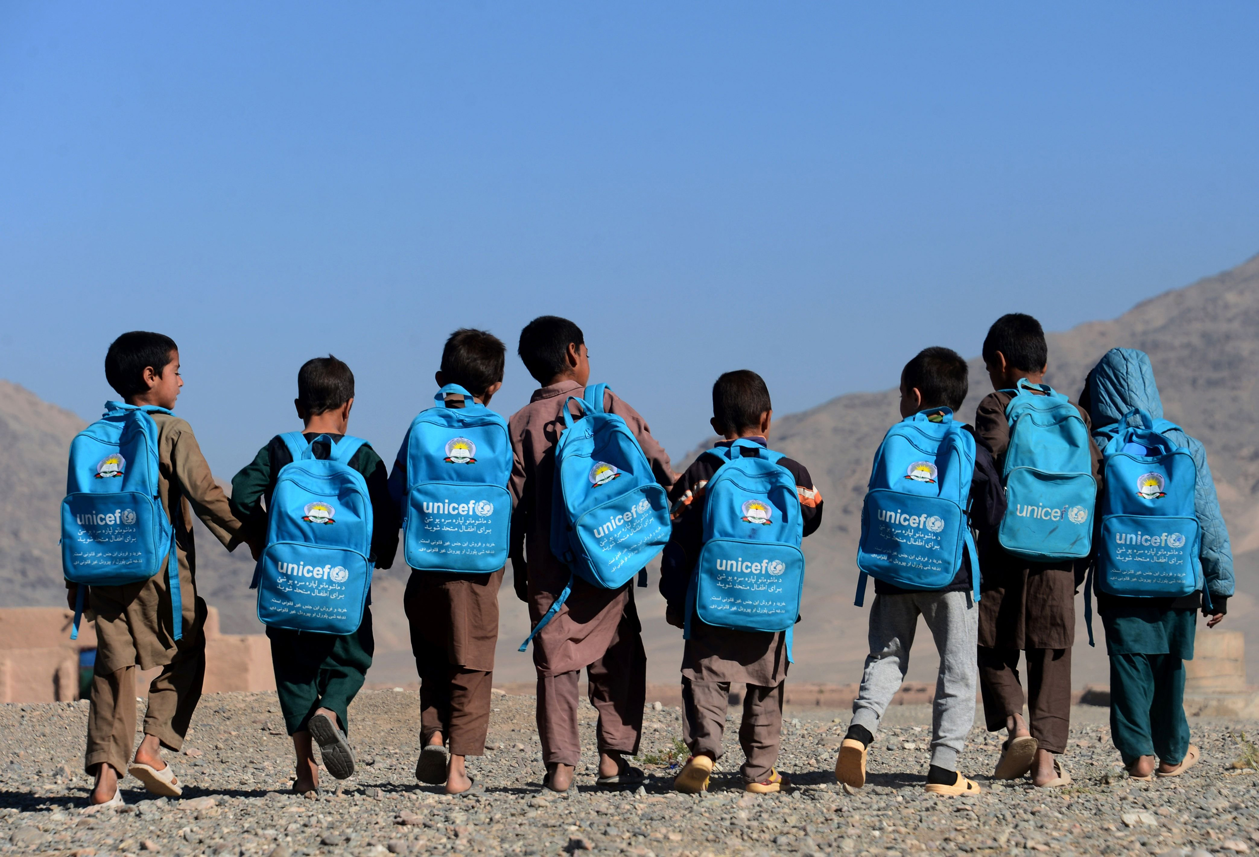 Monday in Pictures: Afghan Boys Head to School and More