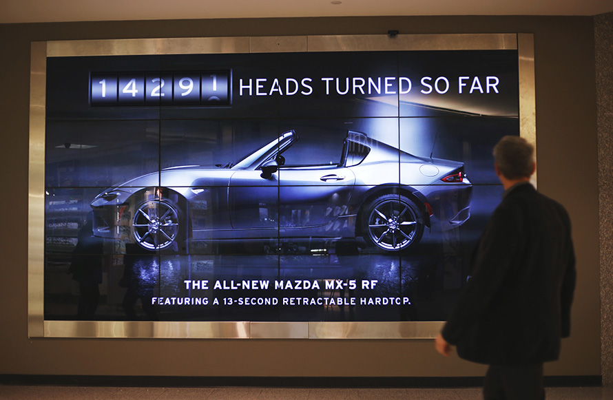 This Mazda Billboard Scans the Crowd to Keep a Tally of How Often ...