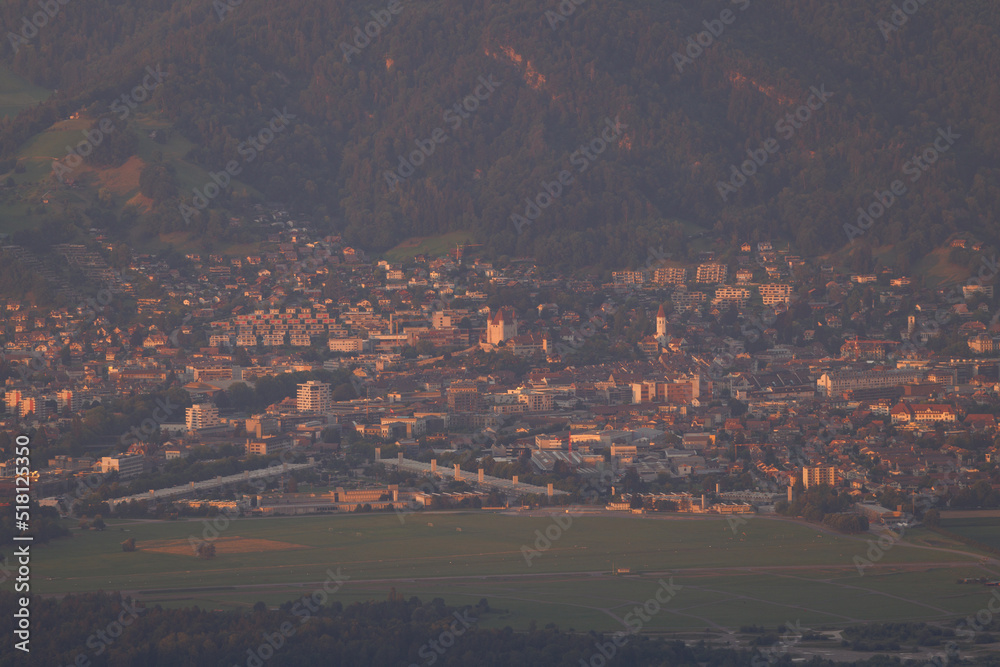 city of Thun seen from Gantrisch at sunset in warm red light Stock ...