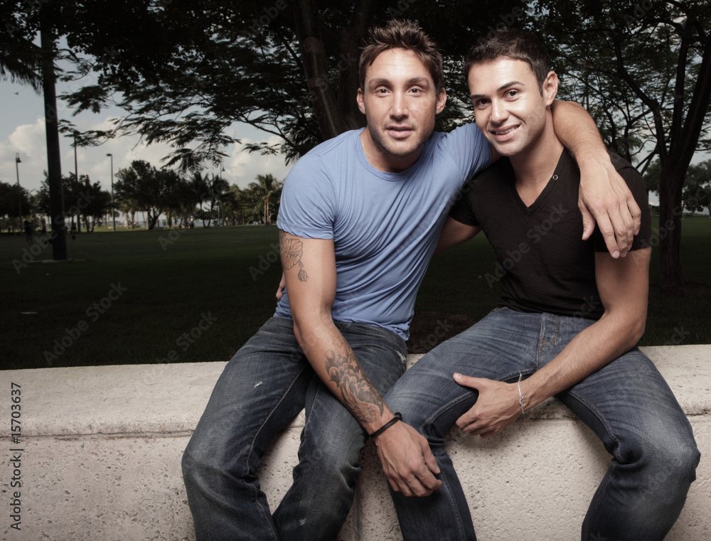 Two handsome young gay men in the park Stock Photo | Adobe Stock