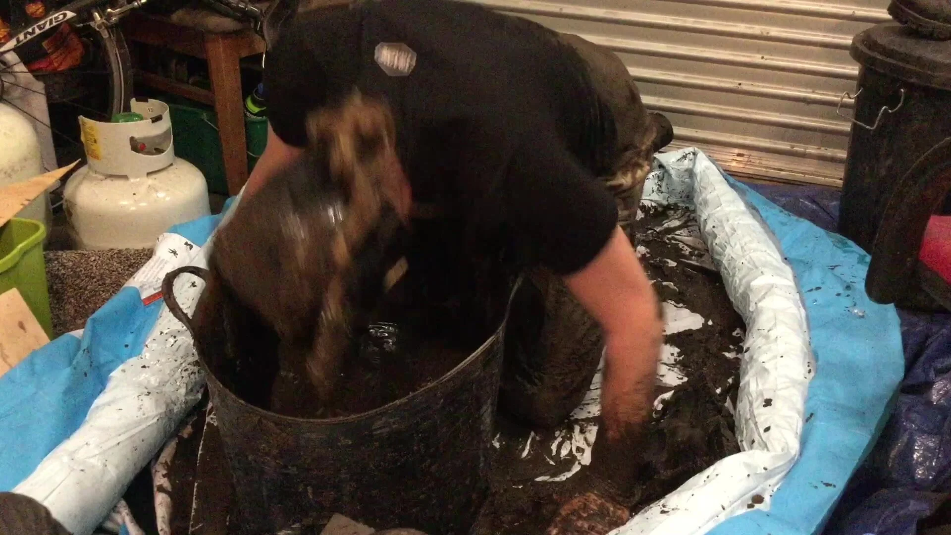 Head dunk into bucket of mud - ThisVid.com