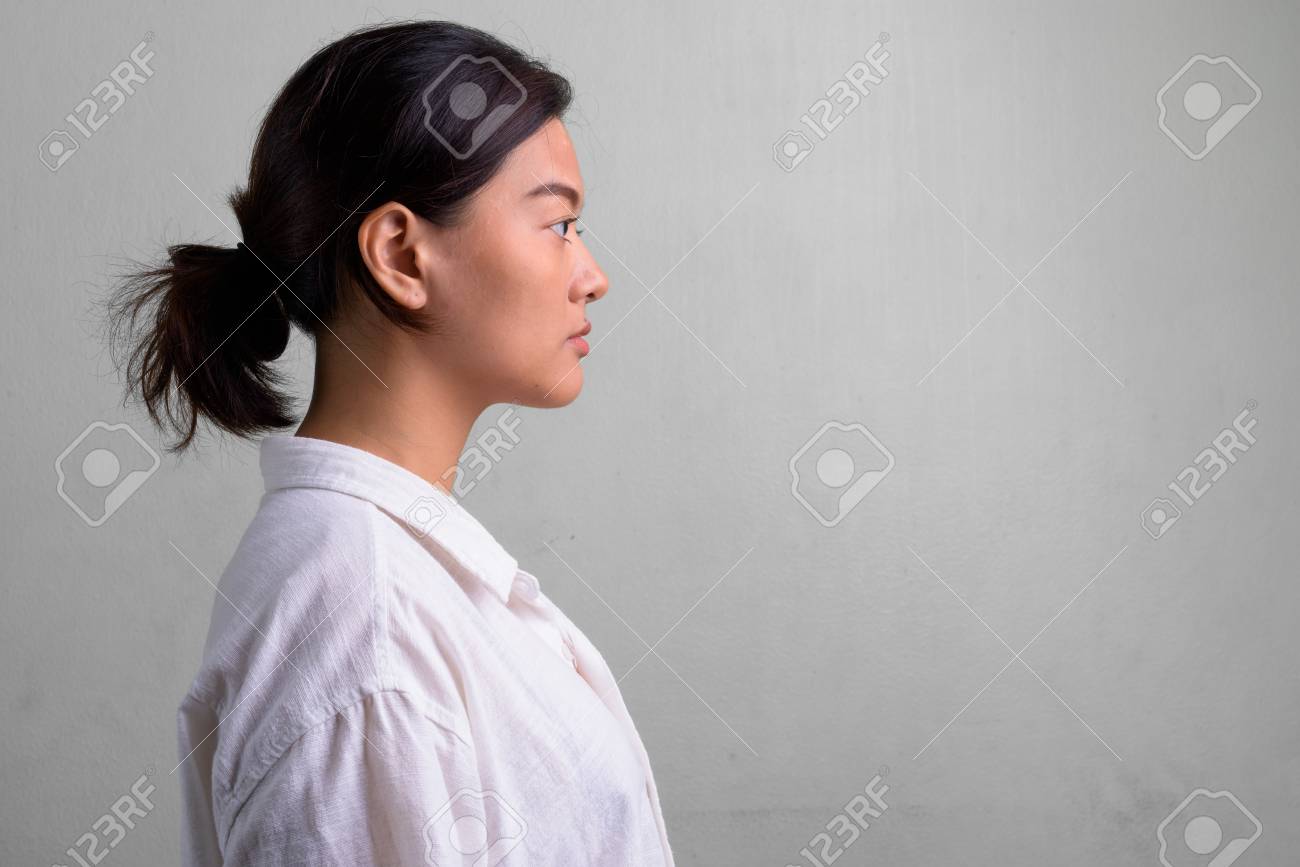 Profile View Of Young Beautiful Asian Woman With Hair Tied Stock ...