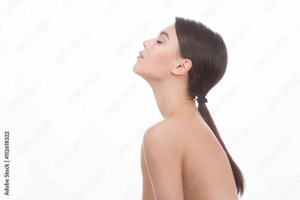 Young woman touching herself isolated on white background. Closeup ...