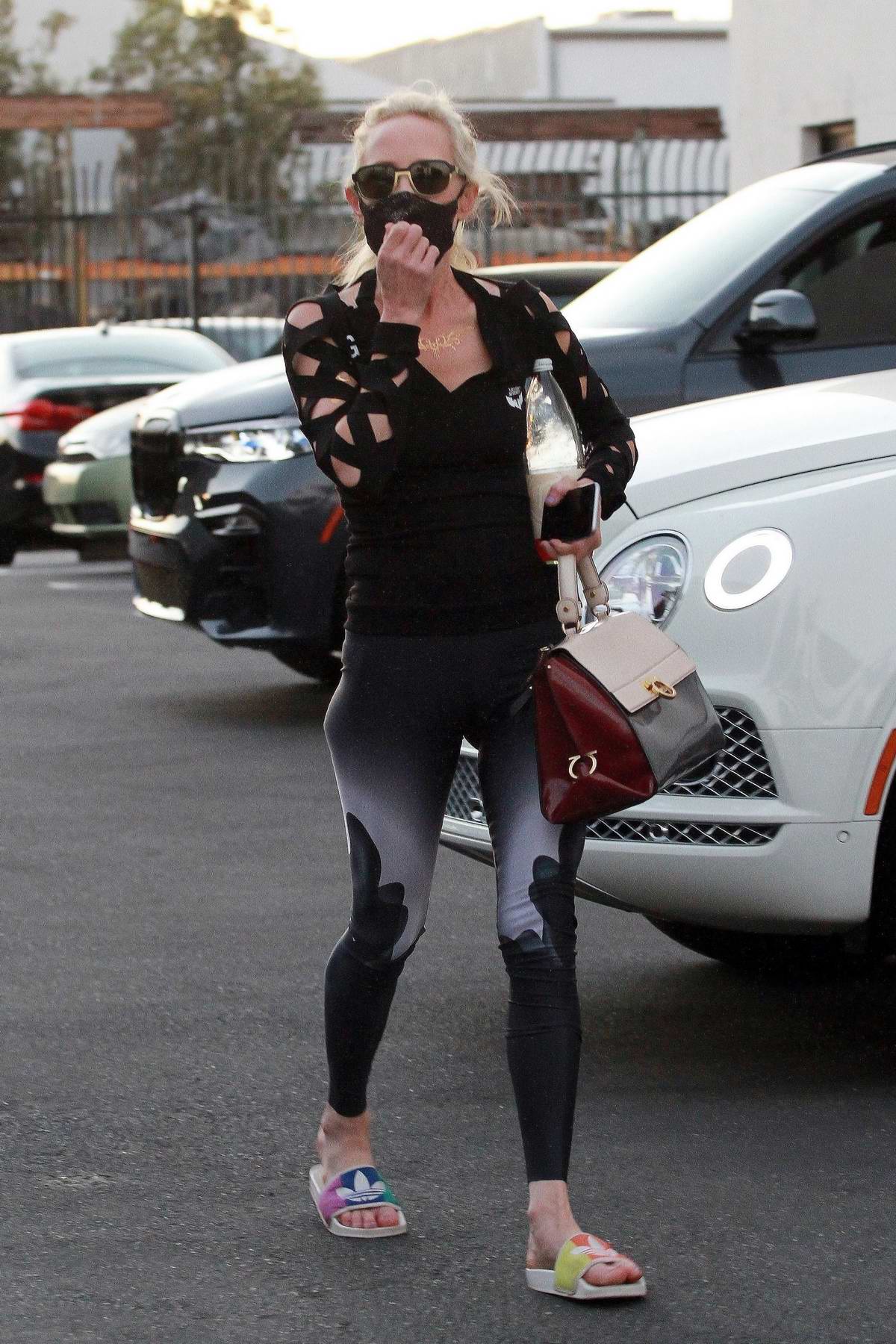 Anne Heche looks excited as she arrives at DWTS studio in Los Angeles