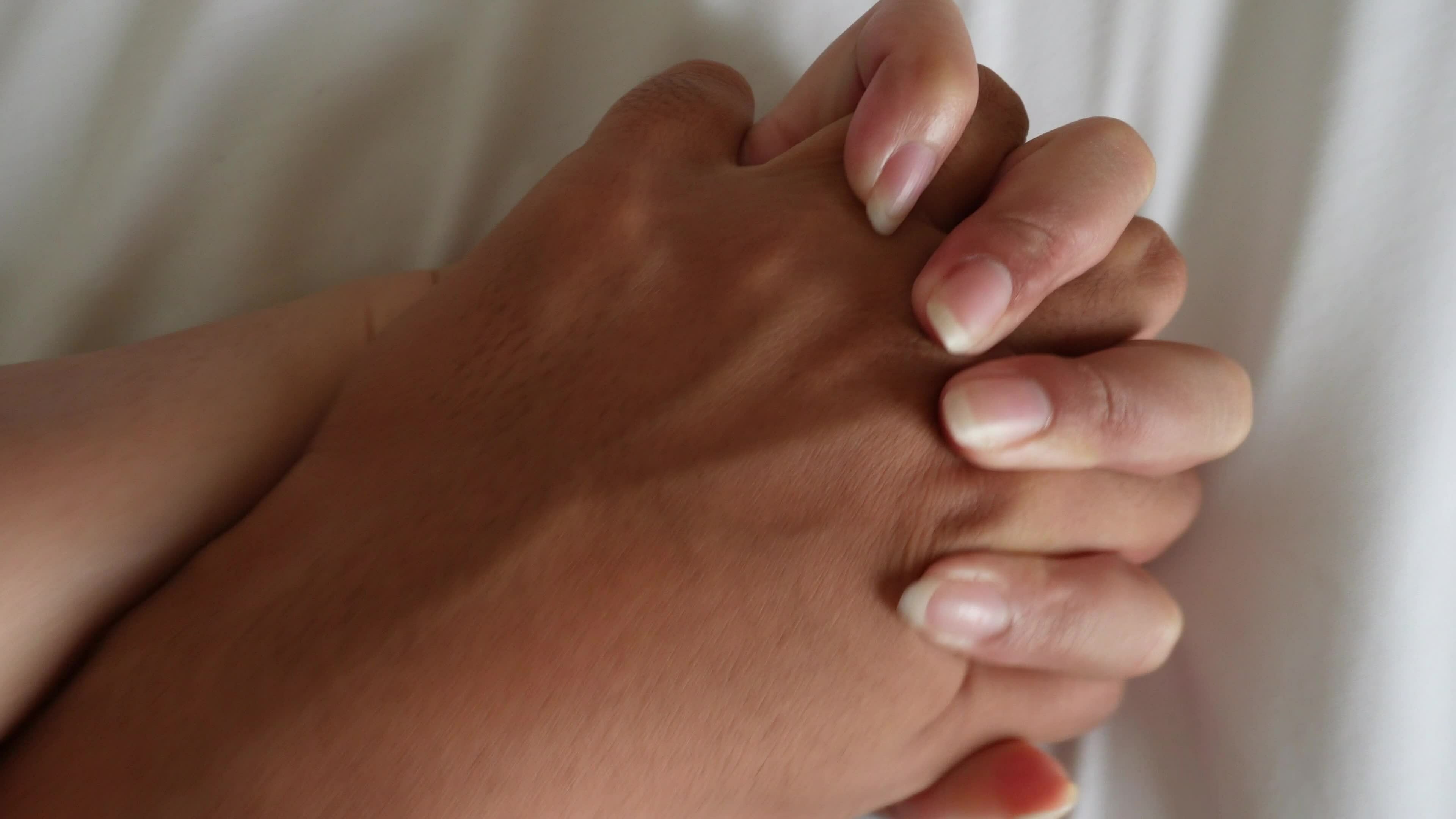 A man and woman's hands having sex on a bed. make love. 28093657 ...