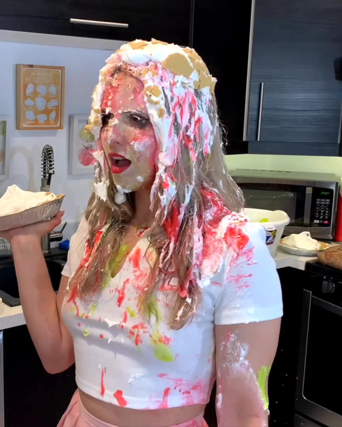 BLONDE GIRL GETS IN THE FACE IN A PIE FIGHT - ThisVid.com