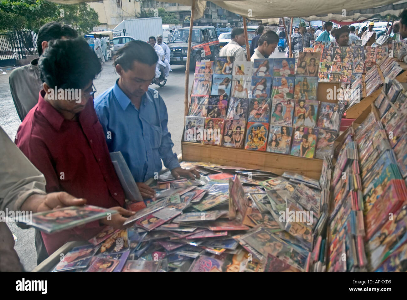 Pakistani men shopping for soft porn pornography VCDs and DVDs ...